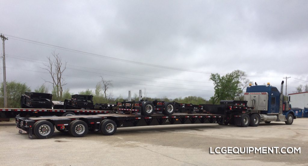 53' step deck trombone & jeep for your next heavy haul
